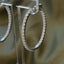 In and Out CZ Oval Shape 36”X 40” Hoop Earrings - Silver