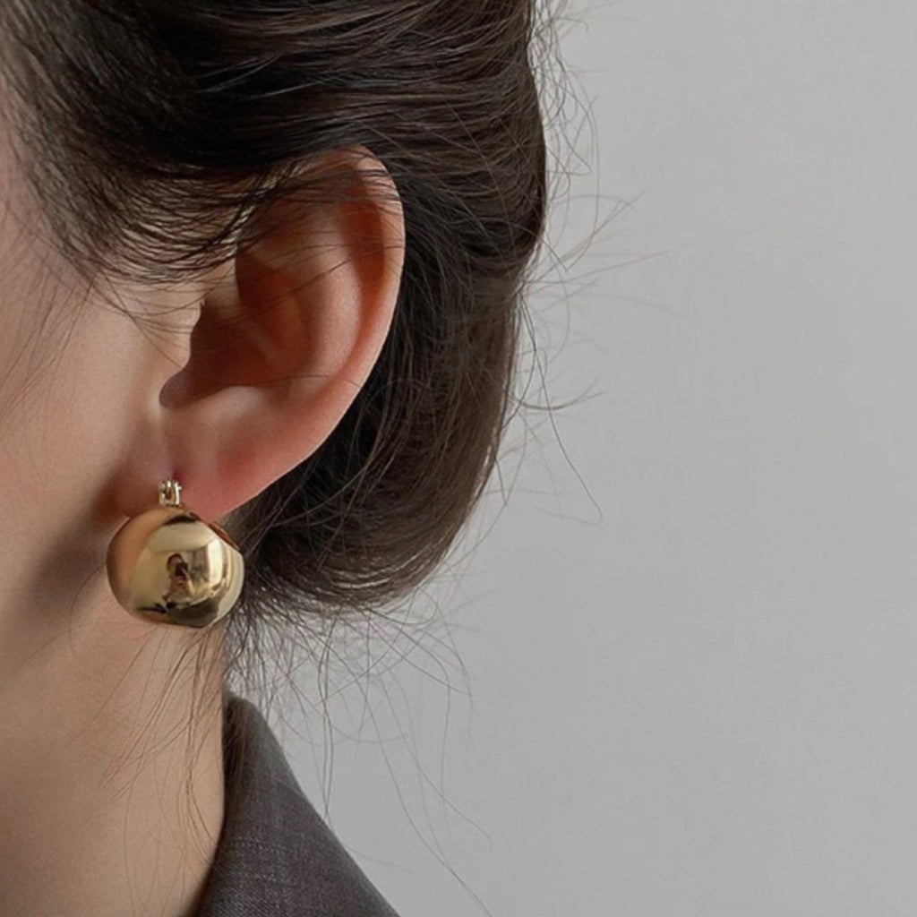 Shiny 18K Gold Plated Ball Huggie Earrings.