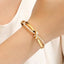 CZ Cross Knotted Bangle Bracelet - Gold and Silver