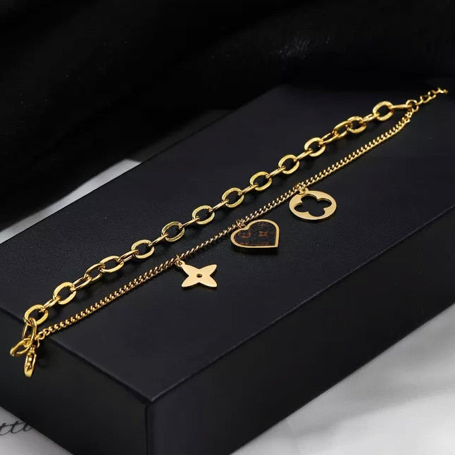 Titanium Steel Four-leaf Flower Heart Bracelet - Gold