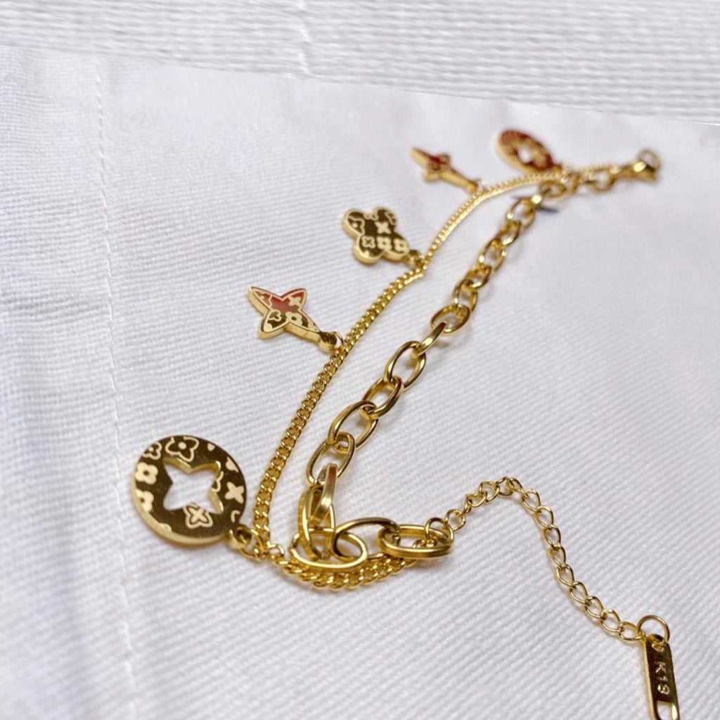 Four Leaf Clover Charms Bracelet - Gold and Silver