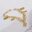 Four Leaf Clover Charms Bracelet - Gold and Silver