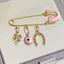 4 CM Pink Enamel Protection Pin With a Clover and Horseshoe Charms - Gold