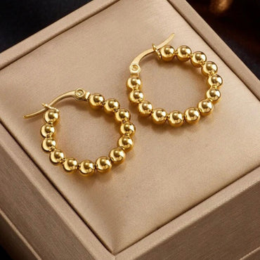 Titanium Steel Four-leaf Flower Heart Bracelet - Gold – Balara Jewelry