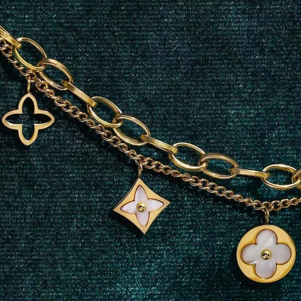 Louis Vuitton Blooming Supple Gold Tone Charm Bracelet